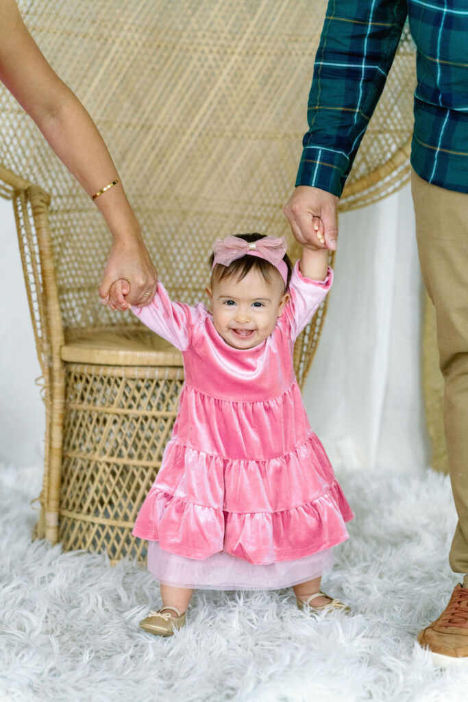 Christmas family photo session in Buford GA - family posing in studio
