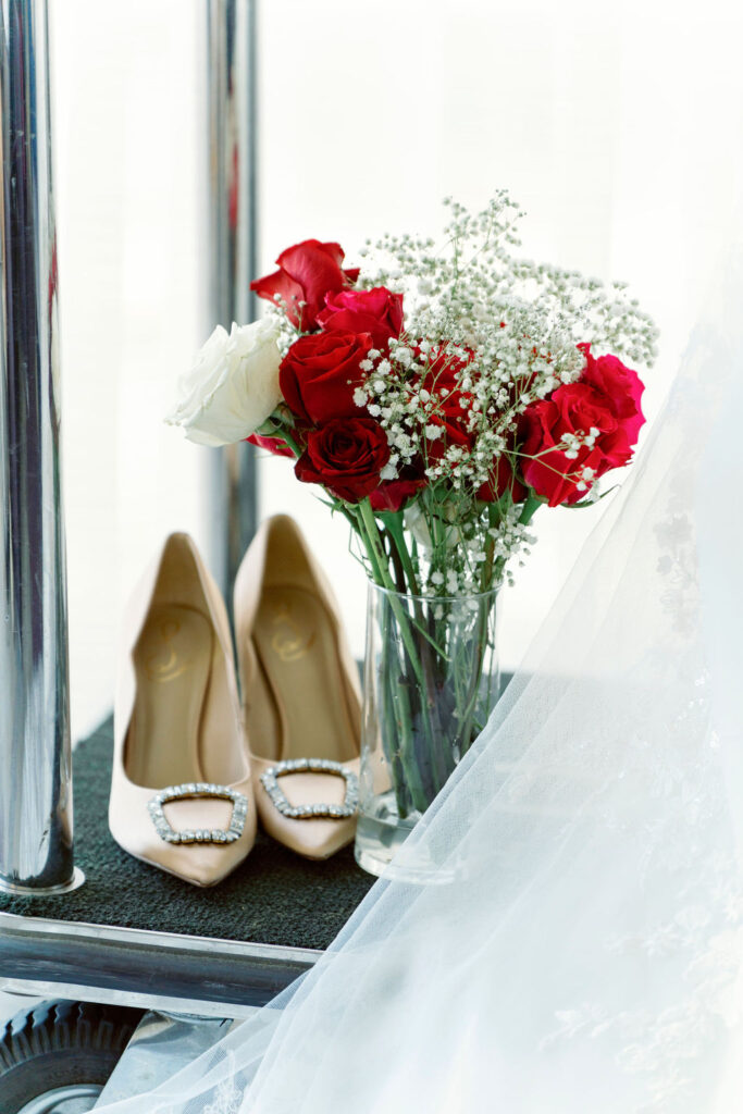 Flat lay of bridal accessories for wedding photo checklist
