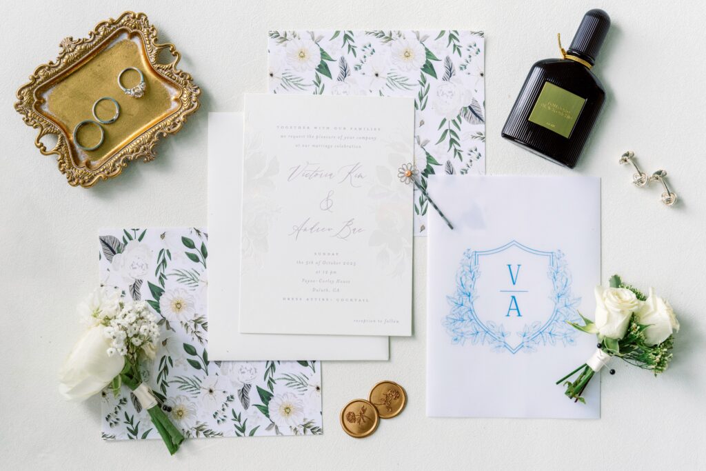 Wedding morning detail shot with dress, rings, and invitations – getting ready timeline