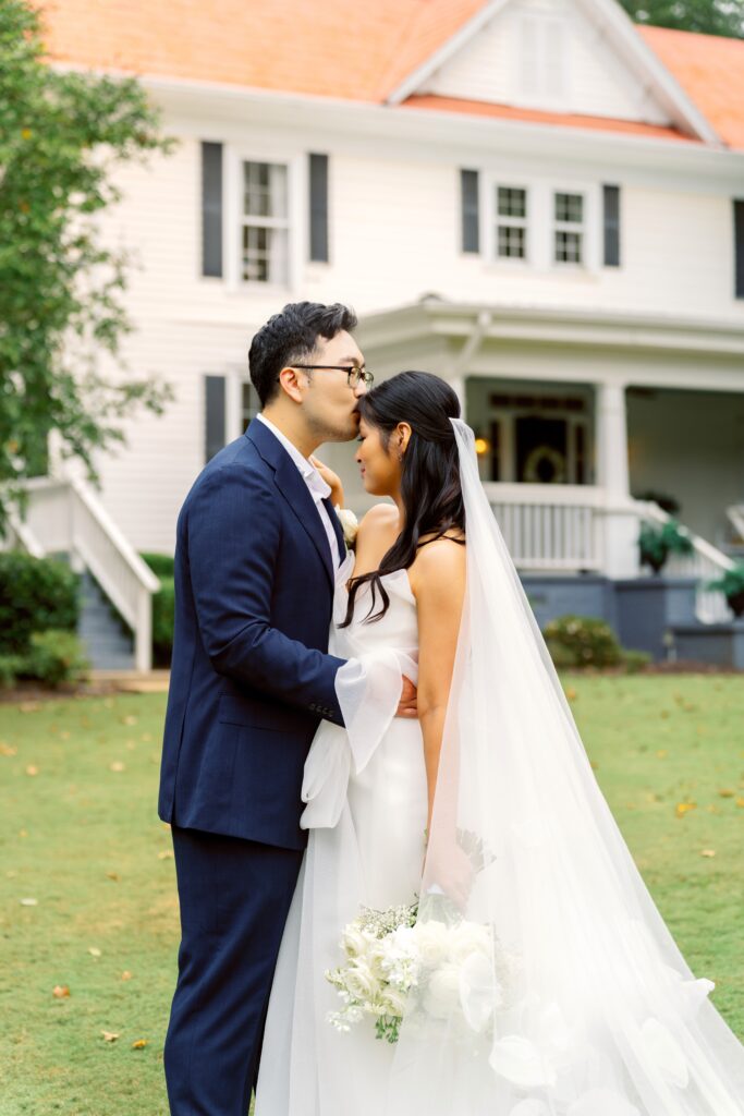 Bride and groom exchanging vows during their wedding day timeline for stress-free photos in Georgia.