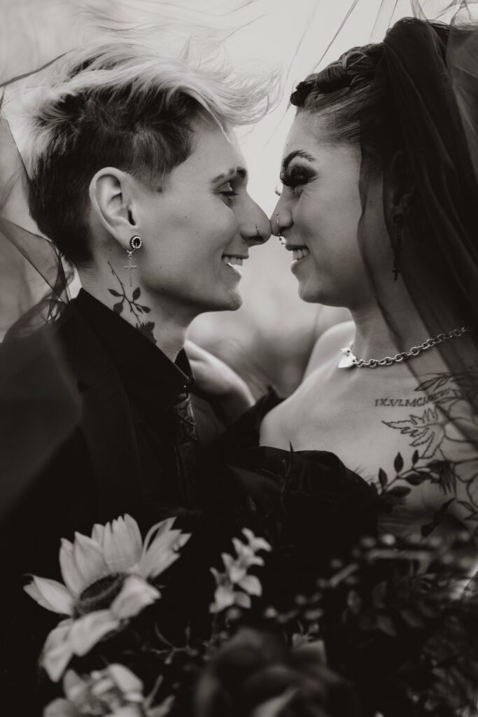 Moody fall bouquet with deep florals and candles | LGBTQ+ wedding inspiration Georgia