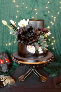 Moody fall bouquet with deep florals and candles | LGBTQ+ wedding inspiration Georgia