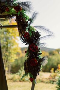 Moody fall bouquet with deep florals and candles | LGBTQ+ wedding inspiration Georgia