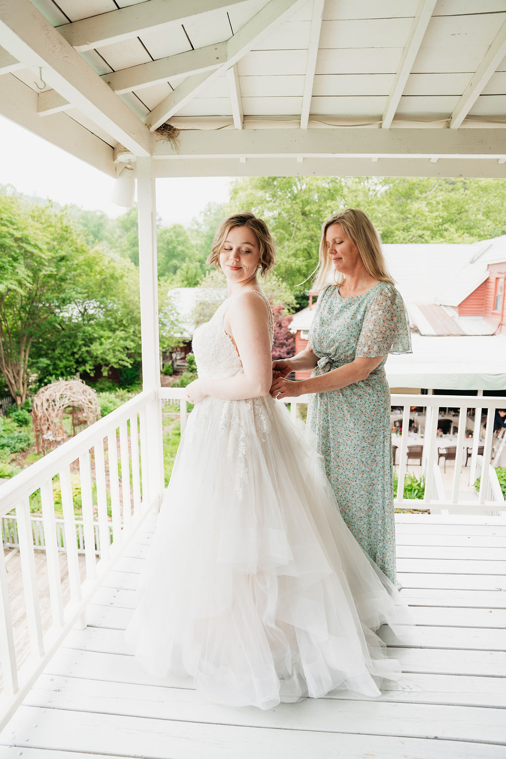 Bride getting ready in the bridal suite at Glen-Ella Springs wedding

