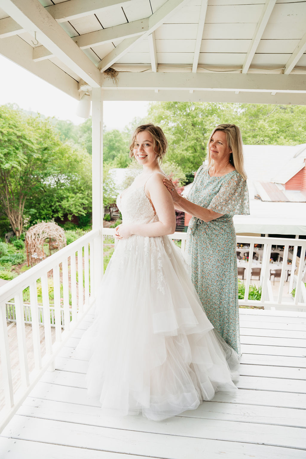 Bride getting ready in the bridal suite at Glen-Ella Springs wedding

