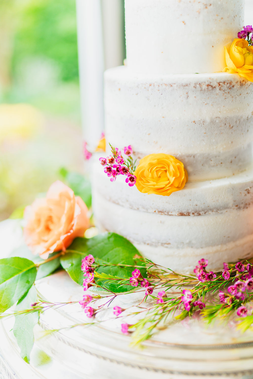 Cake cutting during intimate Glen-Ella Springs wedding reception

