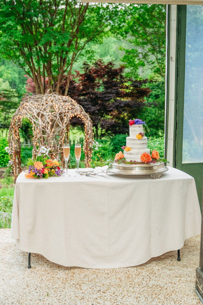 Cake cutting during intimate Glen-Ella Springs wedding reception

