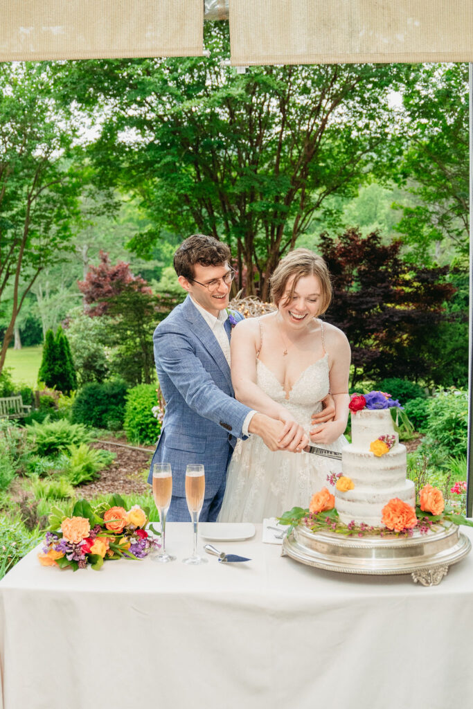 Cake cutting during intimate Glen-Ella Springs wedding reception


