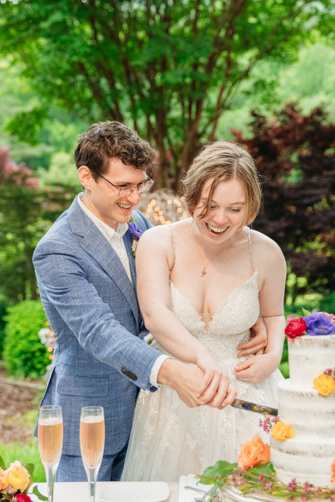 Cake cutting during intimate Glen-Ella Springs wedding reception

